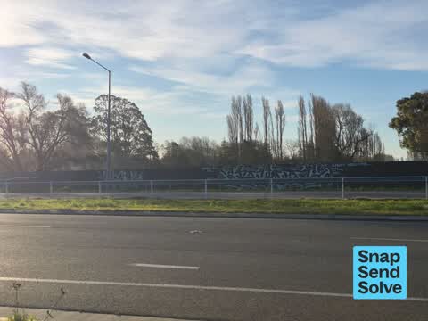 Graffiti on a fence, building or structure, a report photo