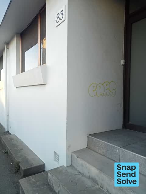 Graffiti on a fence, building or structure, a report photo