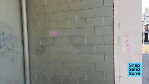 Graffiti on a fence, building or structure — a report photo