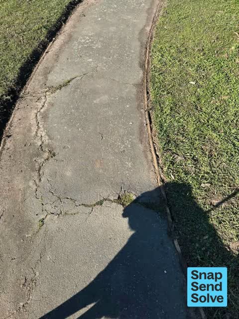 Pavement - Damaged — a report photo