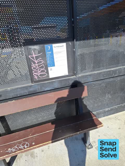 Graffiti on a bus stop or public toilet — a report photo