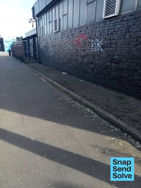 Graffiti on a fence, building or structure, a report photo