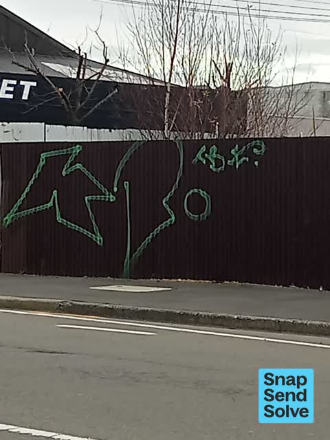 Graffiti on a fence, building or structure, a report photo