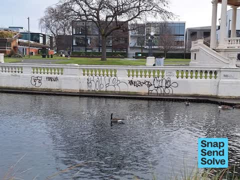 Graffiti on a fence, building or structure — a report photo