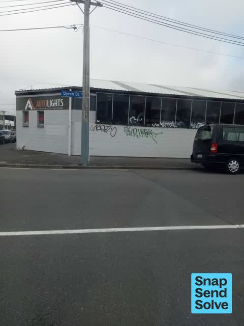 Graffiti on a fence, building or structure, a report photo