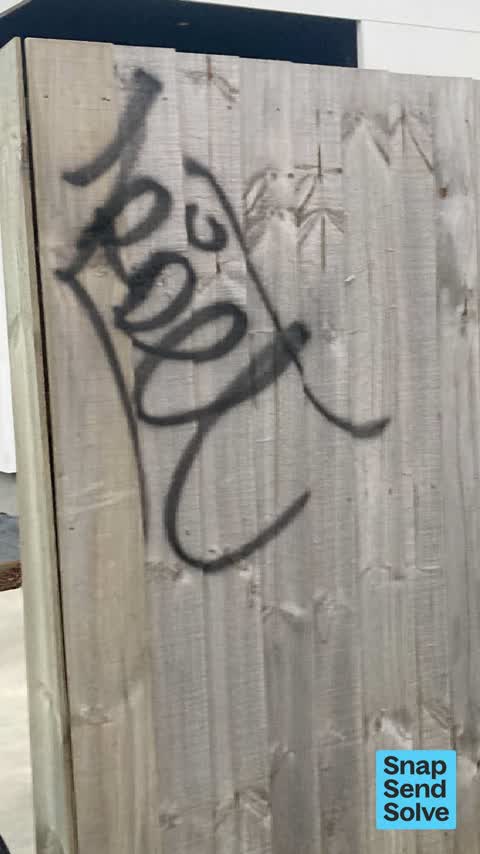 Graffiti on a fence, building or structure, a report photo