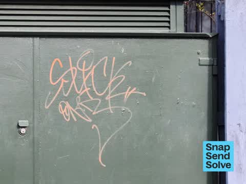 Graffiti on a traffic light pole or cabinet, or wa, a report photo