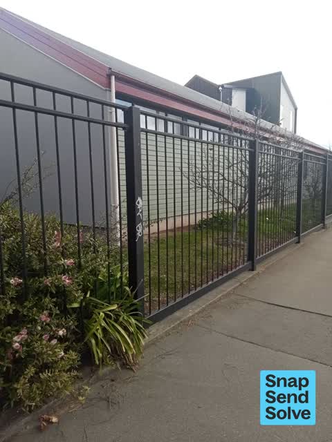 Graffiti on a fence, building or structure — a report photo