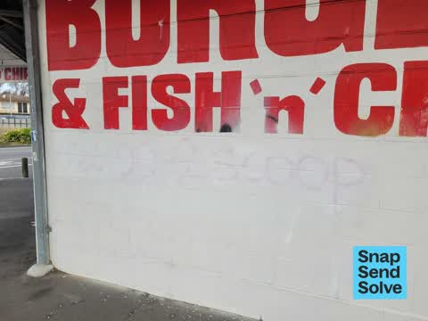 Graffiti on a fence, building or structure — a report photo