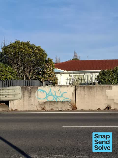 Graffiti on a road, footpath or bridge, a report photo