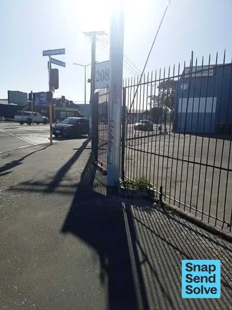 Graffiti on a fence, building or structure, a report photo
