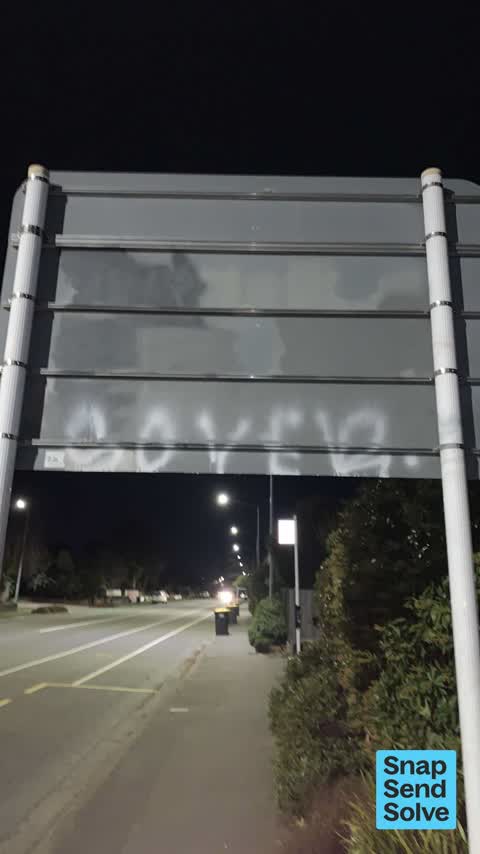 Graffiti on a sign, mural or public art, a report photo