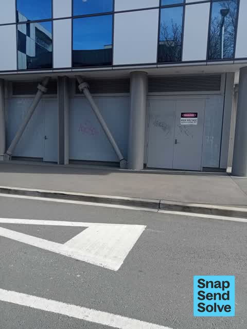 Graffiti on a fence, building or structure, a report photo