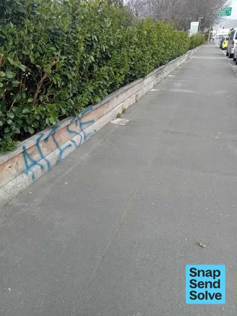 Graffiti on a fence, building or structure, a report photo
