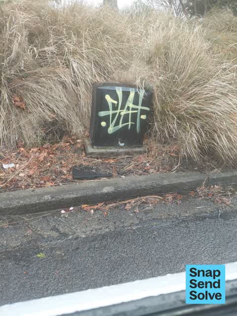 Graffiti on a fence, building or structure, a report photo