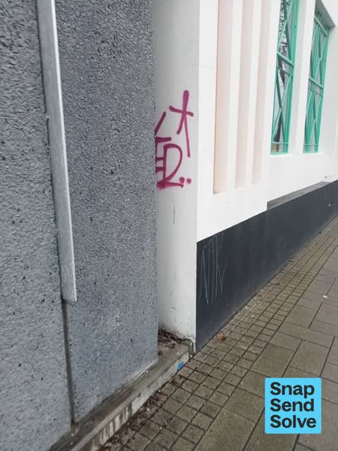 Graffiti on a fence, building or structure, a report photo
