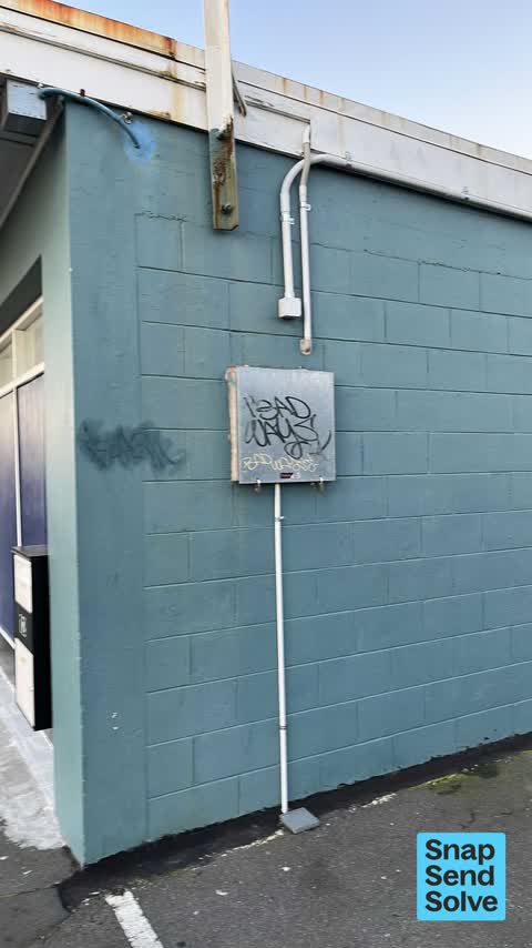 Graffiti on a fence, building or structure, a report photo