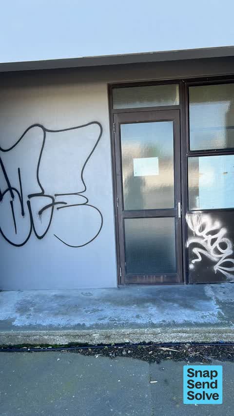 Graffiti on a fence, building or structure, a report photo