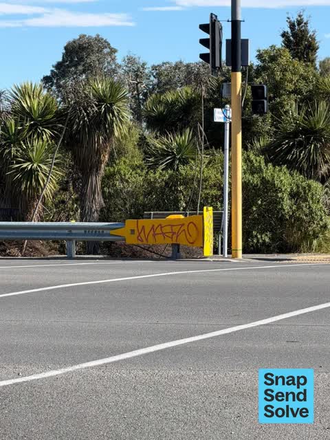 Graffiti on a traffic light pole or cabinet, or wa, a report photo