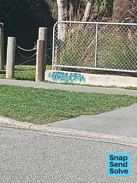 Graffiti on a fence, building or structure, a report photo