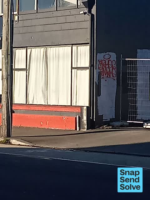 Graffiti on a fence, building or structure, a report photo