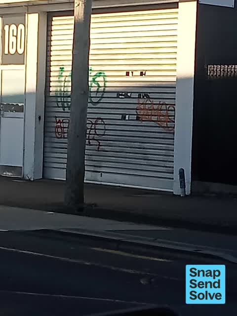 Graffiti on a fence, building or structure — a report photo