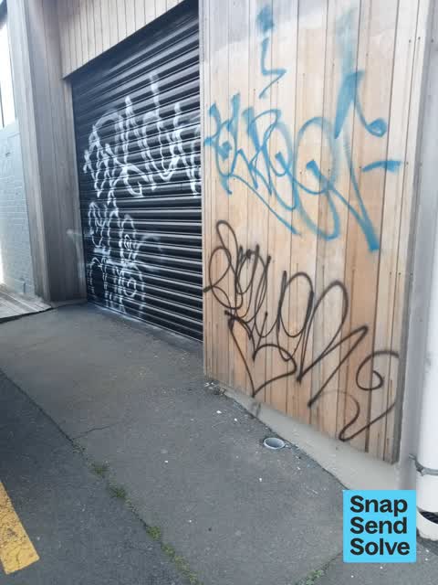 Graffiti on a fence, building or structure — a report photo