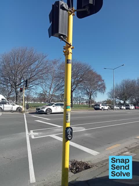 Graffiti on a traffic light pole or cabinet, or wa, a report photo