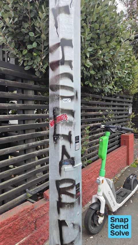 Graffiti on a fence, building or structure, a report photo