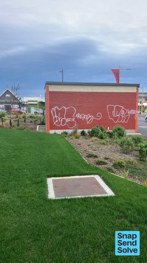 Graffiti on a fence, building or structure, a report photo