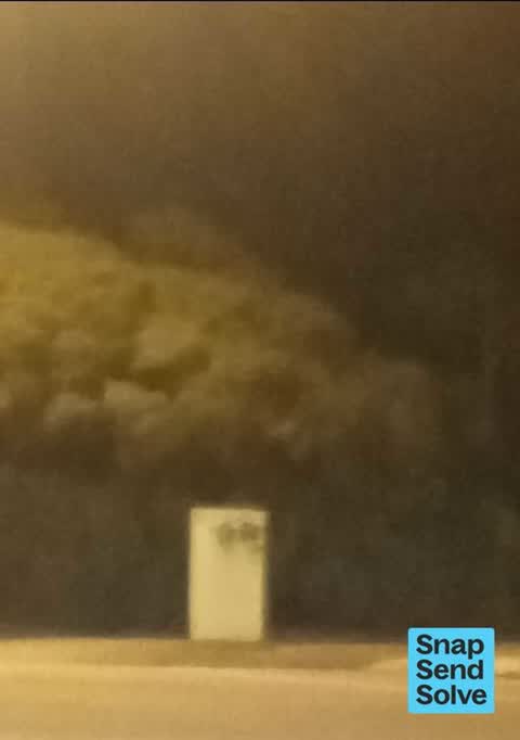Graffiti on a traffic light pole or cabinet, or wa, a report photo