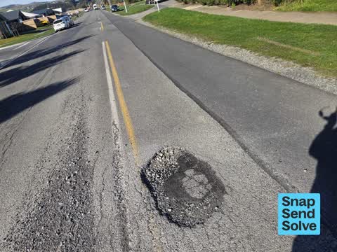 Pothole, a report photo