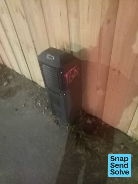 Graffiti on a fence, building or structure, a report photo