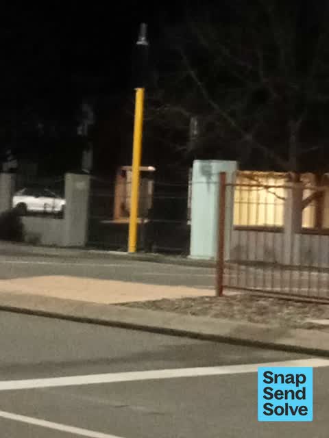 Graffiti on a traffic light pole or cabinet, or wa, a report photo