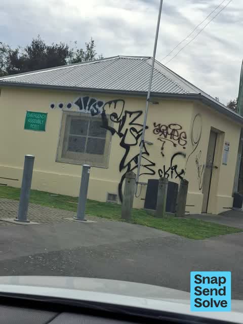 Graffiti on a fence, building or structure — a report photo