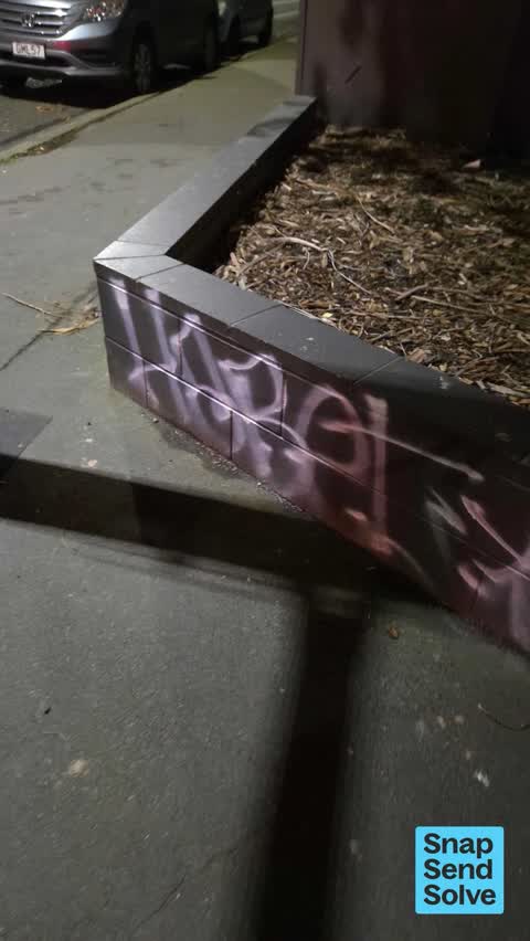 Graffiti on a fence, building or structure, a report photo