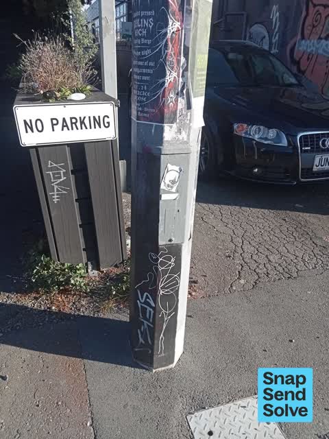 Graffiti on a fence, building or structure, a report photo