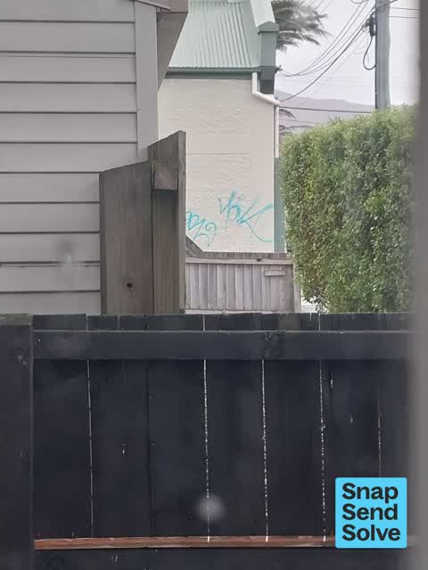 Graffiti on a fence, building or structure, a report photo