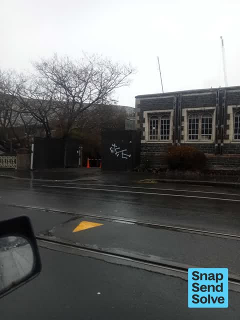 Graffiti on a fence, building or structure — a report photo