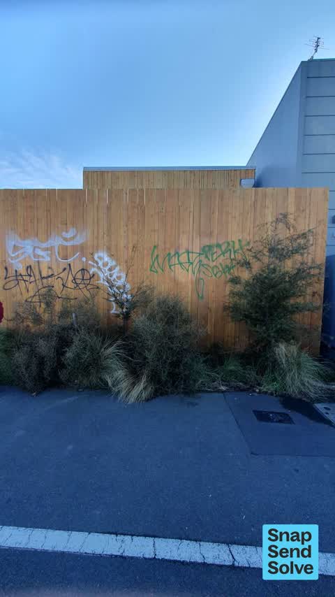 Graffiti on a fence, building or structure, a report photo