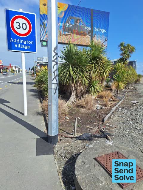 Graffiti on a traffic light pole or cabinet, or wa, a report photo