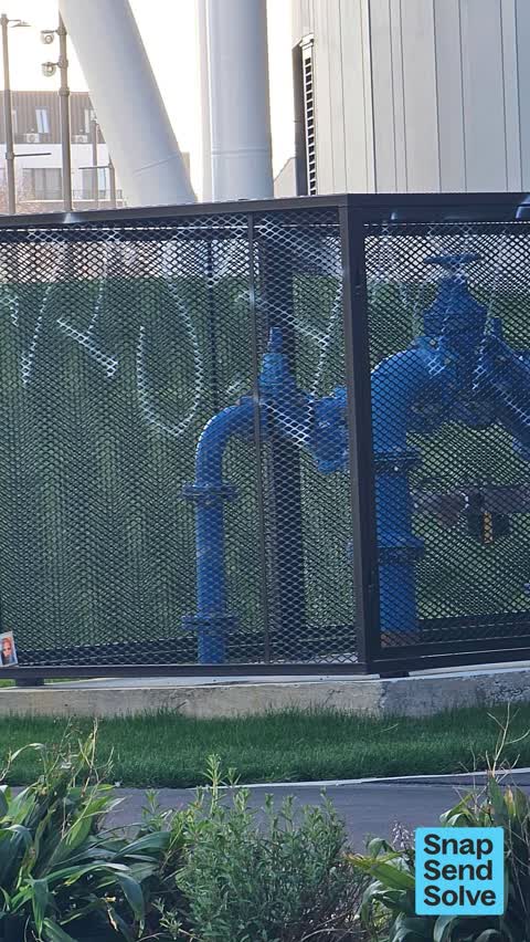 Graffiti on a fence, building or structure — a report photo