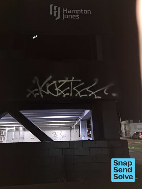 Graffiti on a fence, building or structure — a report photo