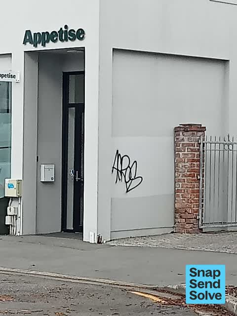 Graffiti on a fence, building or structure, a report photo