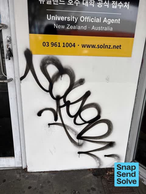 Graffiti on a fence, building or structure, a report photo