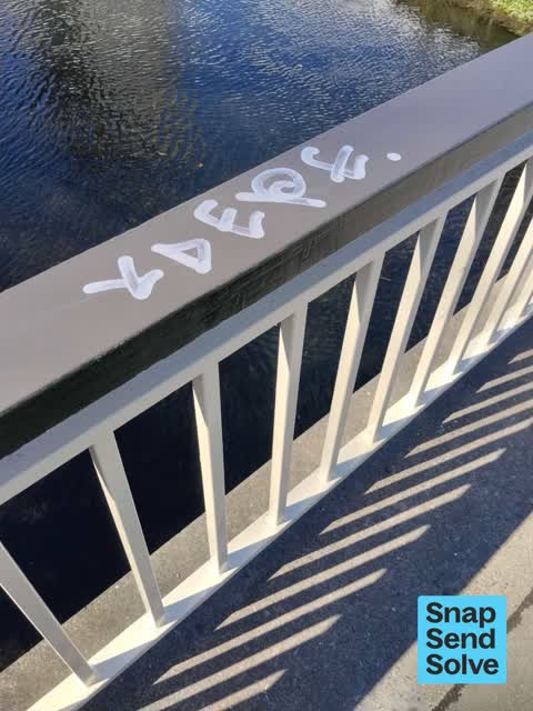 Graffiti on a road, footpath or bridge — a report photo
