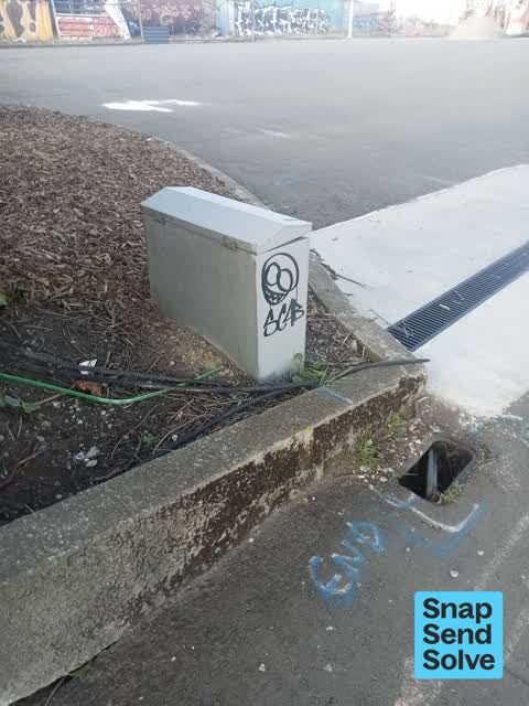 Graffiti on a fence, building or structure, a report photo