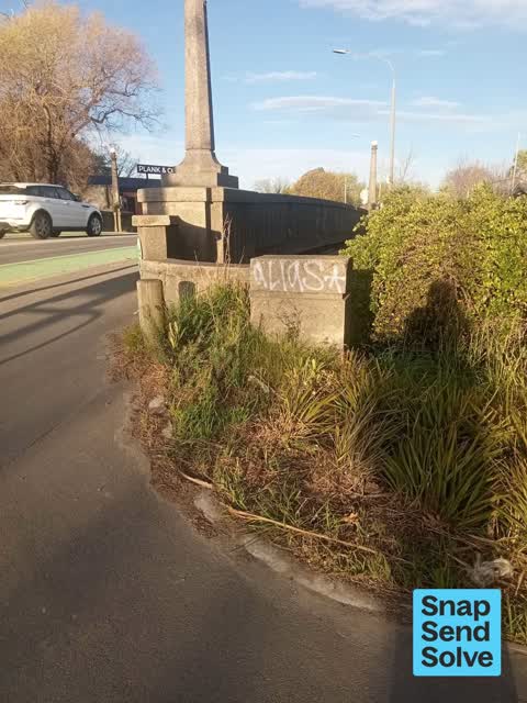 Graffiti on a road, footpath or bridge, a report photo