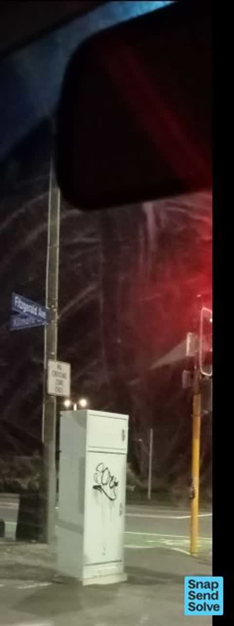 Graffiti on a traffic light pole or cabinet, or wa, a report photo