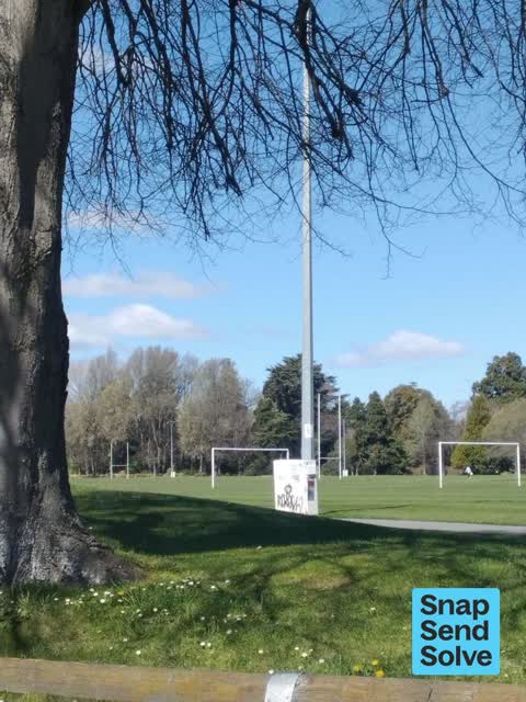 Graffiti on a traffic light pole or cabinet, or wa, a report photo